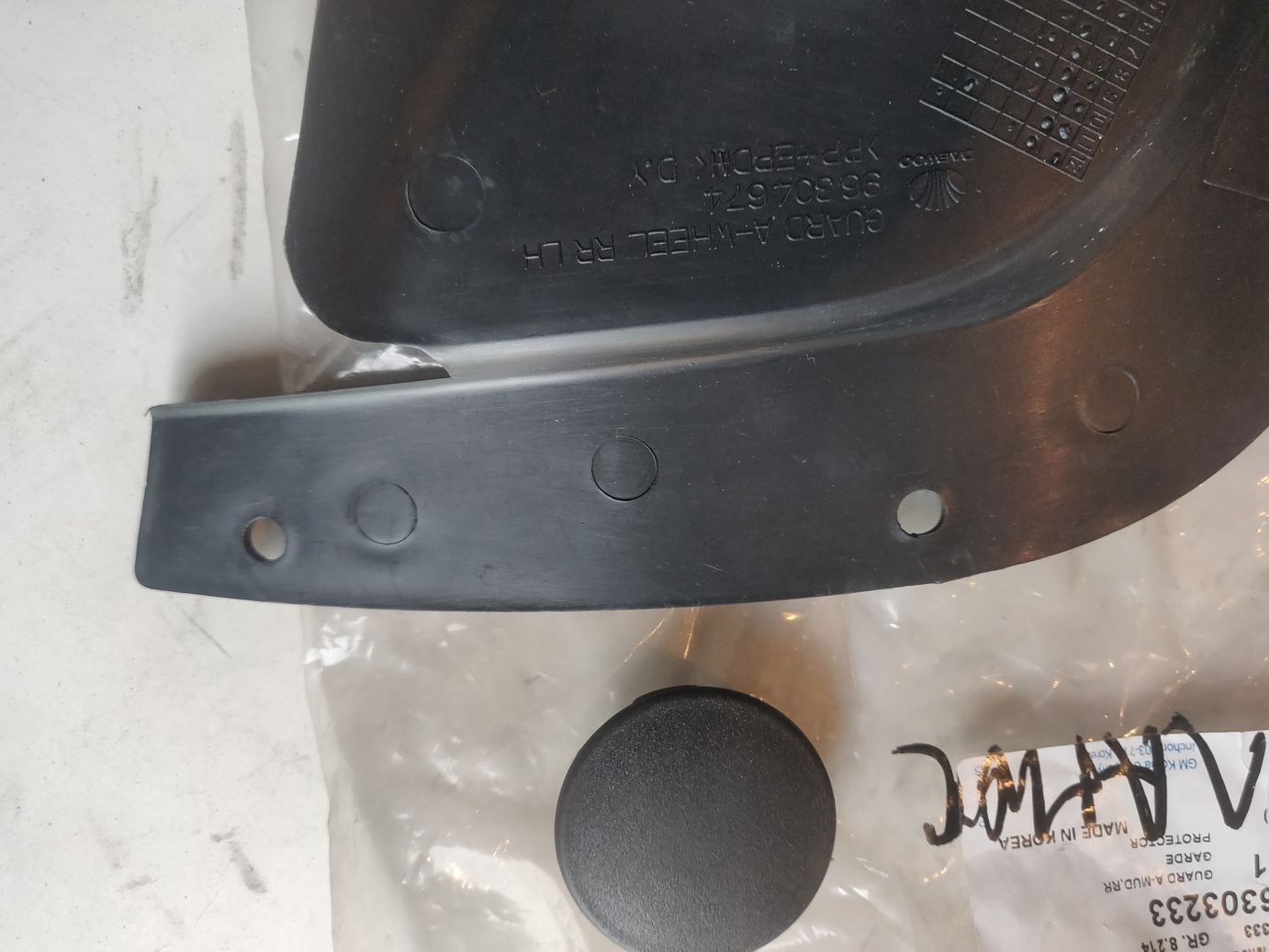 Брызговик задний левый на Chevrolet Lanos седан